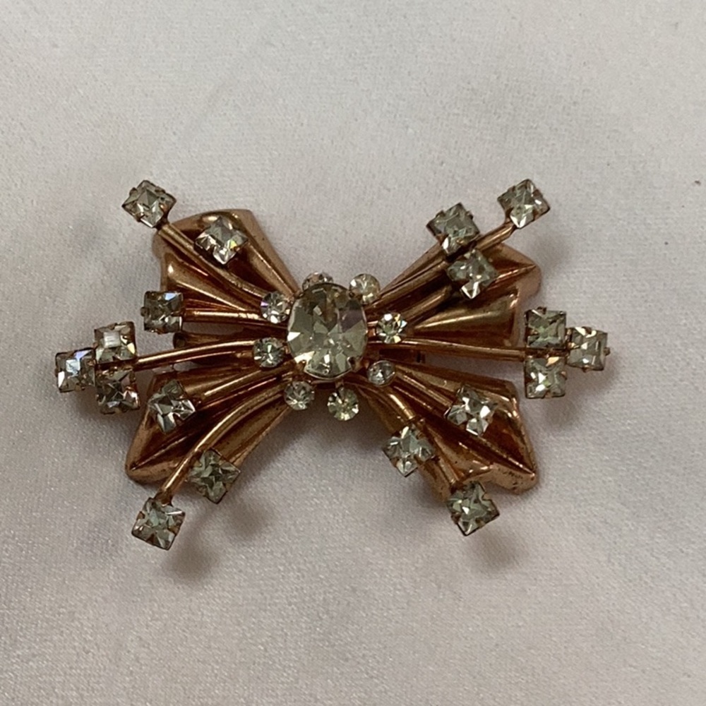 Vintage mid century Gold tone bow pin with crystals